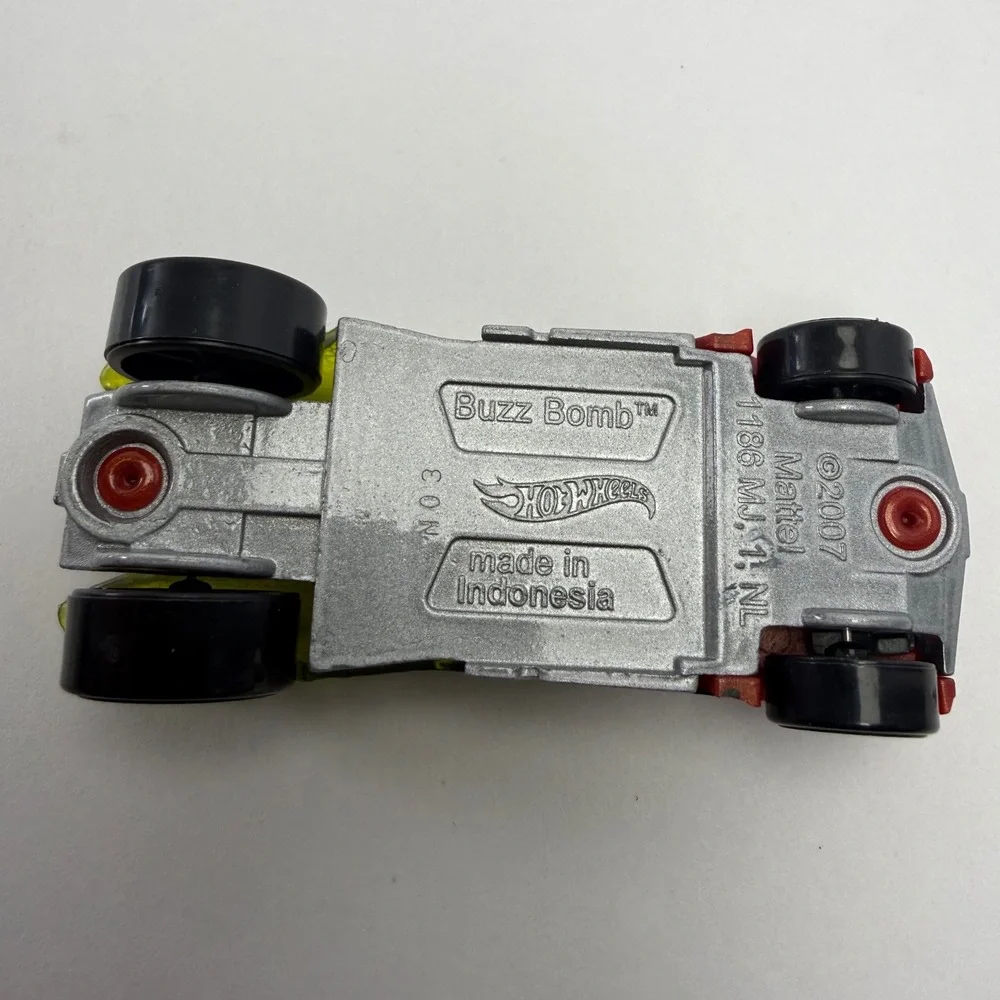 Hot Wheels Buzz Bomb Metallic Red Translucent Yellow Wings Diecast Car 2007